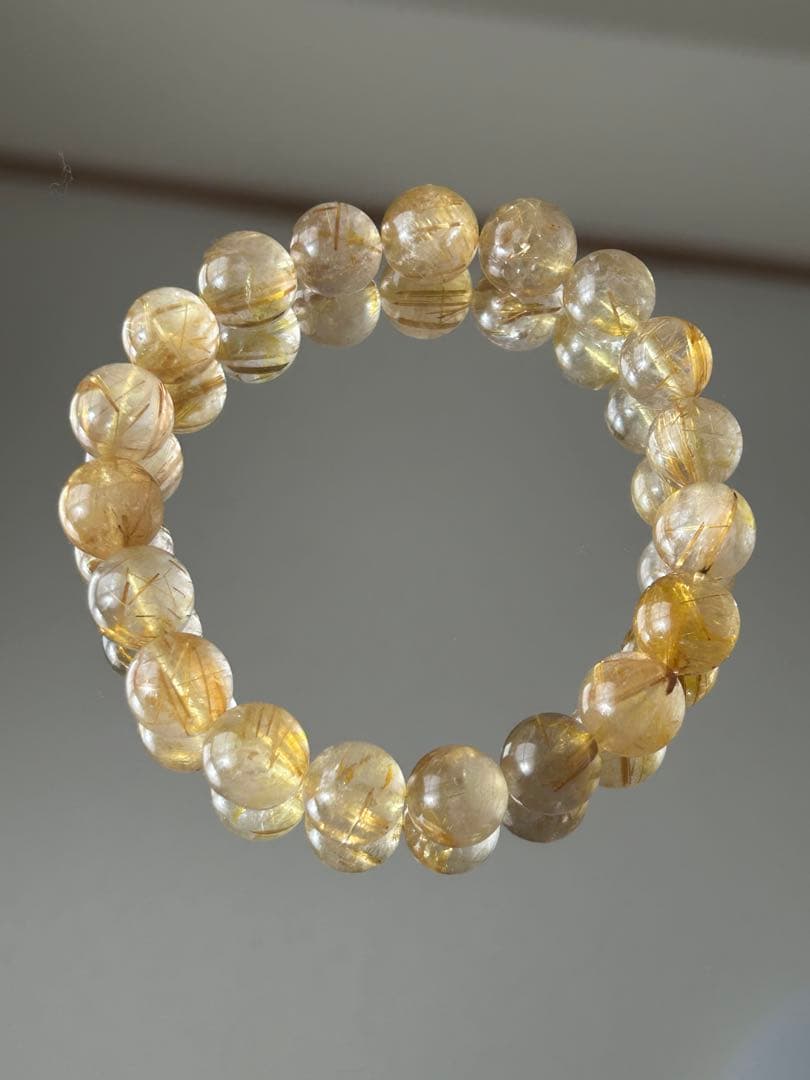 高品質 ゴールドルチルクォーツ ブレスレット 11mm 内径18cm 高品質++]ゴールドルチルクォーツブレスレット（約11mm玉） - 埼玉県